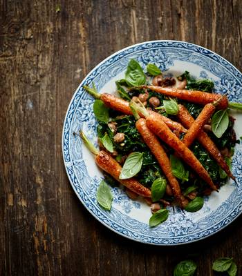 Warm carrot salad with spicy raisin and pine nut dressing
