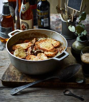 Beef and ale stew with cheese and mustard croûtes
