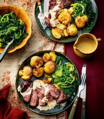 Peppered venison steak with whisky sauce and roasties