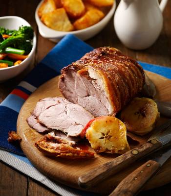 Roast pork shoulder with crackling and cider gravy