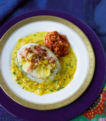 Hake with Serrano ham and roasted pepper sauce