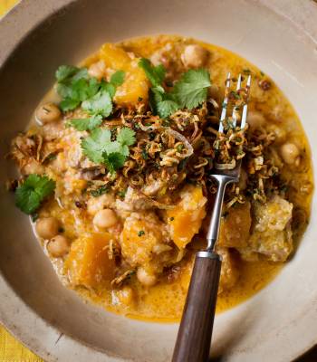 Chicken, pumpkin and chickpea korma with crispy shallots