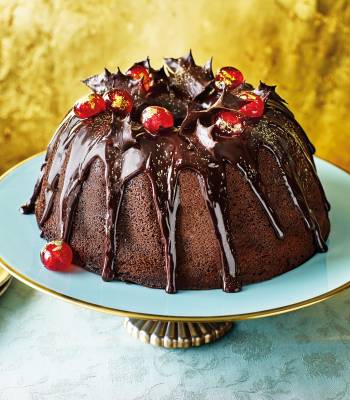 Mulled wine bundt cake with chocolate holly and gilded cherries