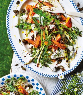 Warm squash and goats’ cheese salad with pumpkin seed crunch
