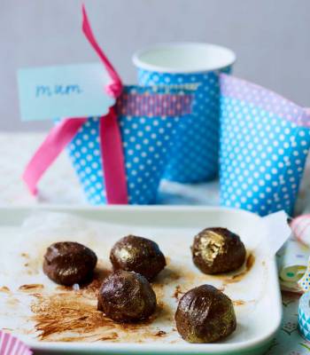 Gold-dusted salted chocolate truffles