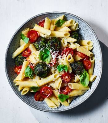 Pasta with roasted spinach polpette and tomatoes 
