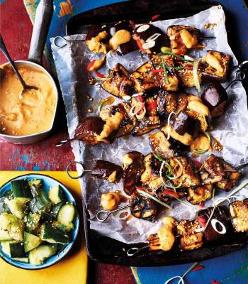 Aubergine skewers with satay sauce and smashed cucumber