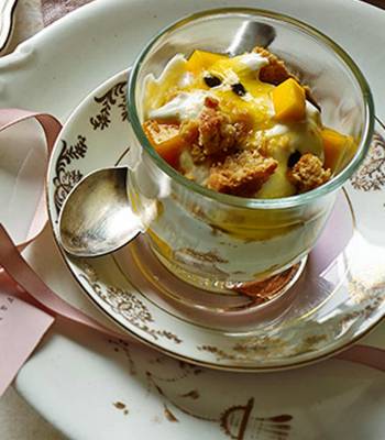 Passion fruit pots with cookie crumbs