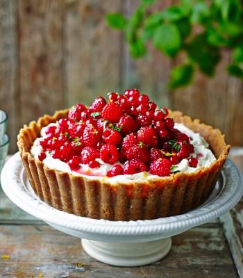 Pile-it-high raspberry and redcurrant cheesecake tart