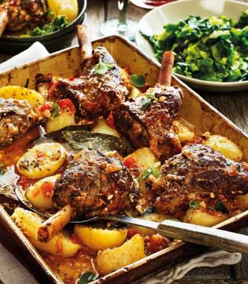 Greek lamb kleftiko with potatoes, oregano and lemon
