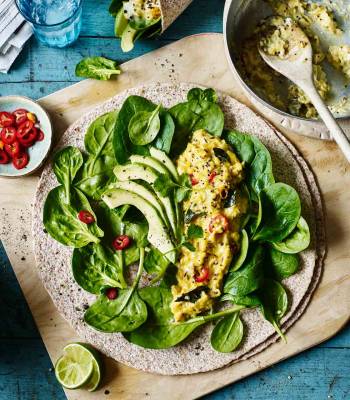 Scrambled egg wrap with Indian spices, avocado and greens