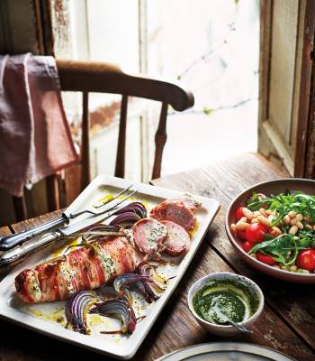 Stuffed roast pork fillet with cannellini bean and tomato salad