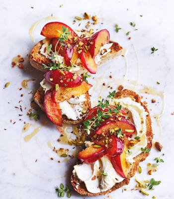 Creamy cheese toast with roast plums and pistachio dukkah