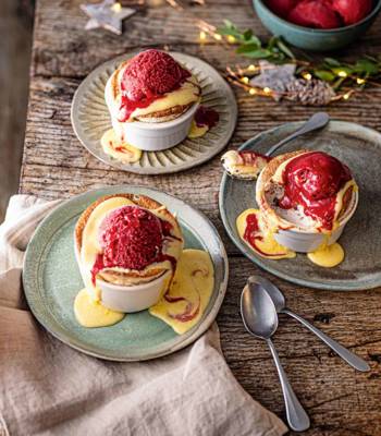 Christmas pudding soufflé with cranberry sorbet and brandy anglaise