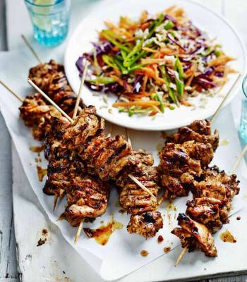 Spicy jerk chicken skewers with brown rice slaw