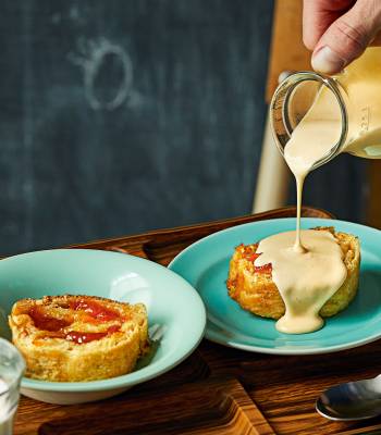 Apricot jam roly-poly with cardamom and vanilla custard