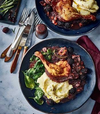 Braised duck legs with blackberries and celeriac mash