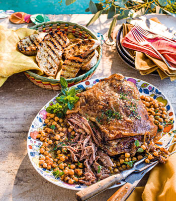 Braised shoulder of lamb with chickpeas, onions, garlic and oregano
