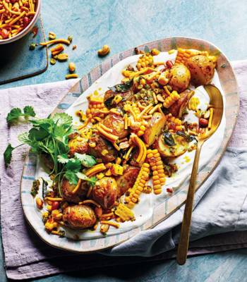 Roast jersey royals and curry leaf sweetcorn with ginger yogurt