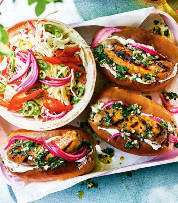 Chimichurri hot dogs with pickled pink onion and pepper slaw