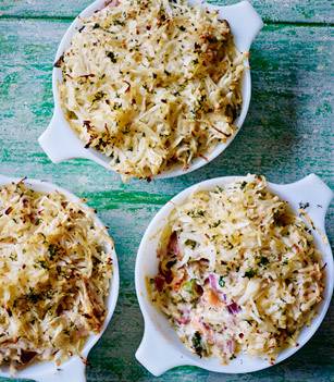 Salmon, bacon and kale pies with celeriac and horseradish rosti topping