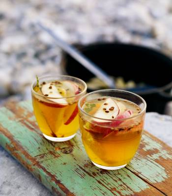 Hot toddy with bay leaves and orange