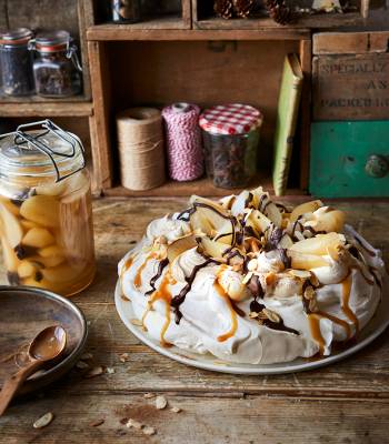 Pavlova with spiced pears and salted caramel sauce