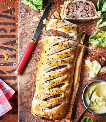 Pork and stout sausage roll with mustard dip  
