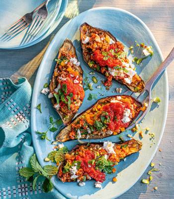 Spicy sausage-stuffed aubergines