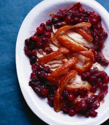 Roast loin of pork with cranberry orange sauce