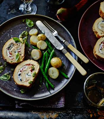 Three-cheese roulade with piquante peppers and olives 