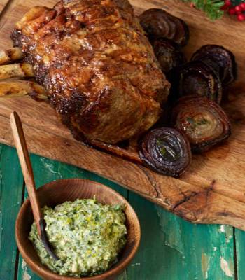 Roast ribs of beef with roasted red onions 