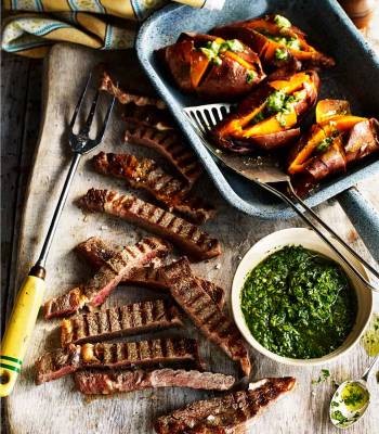 Steaks with chimichurri salsa and baked sweet potatoes