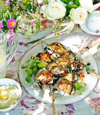 Aubergine, pepper and halloumi kebabs with lemony houmous