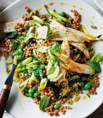 Cumin chicken with giant couscous, courgette, peas and mint