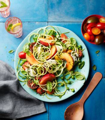 Summer garden salad with peaches and mozzarella
