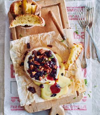 Camembert baked with maple syrup, pecans and blueberries
