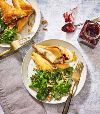Cheese and cranberry parcels with baby kale salad