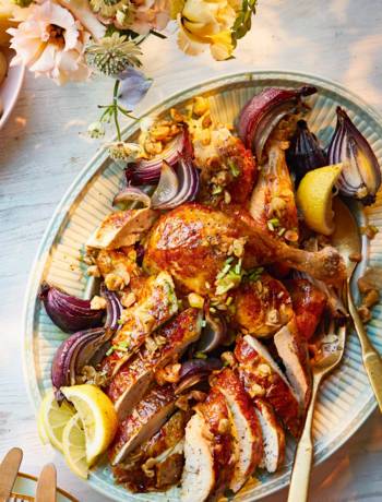 Roast chicken with herby lemon butter and hazelnut vinaigrette
