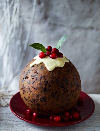 Cranberry gingerbread Christmas pudding with ginger sauce