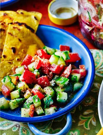 Turmeric socca with cucumber, pepper and tahini salad