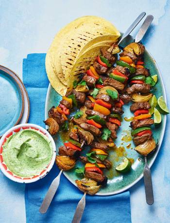Steak fajita skewers with a creamy guacamole dip