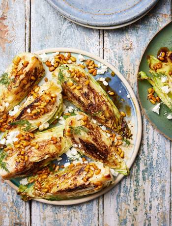 Charred cabbage with spicy brown butter, pine nuts and feta