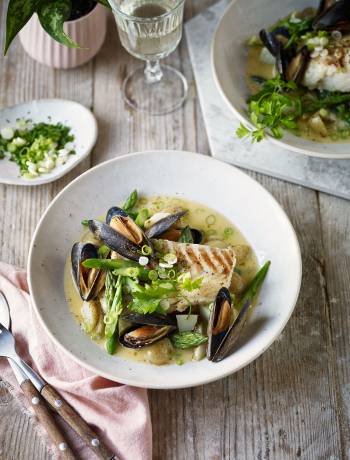 Cod with a spring broth of asparagus, Jersey Royals and mussels 