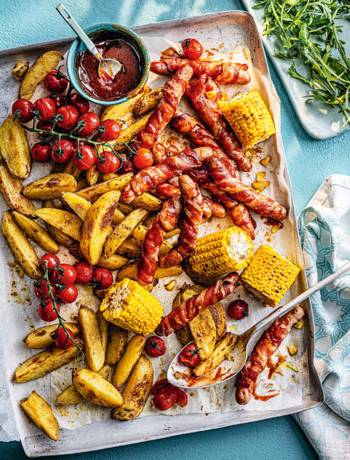 Smoky pigs-in-blankets traybake