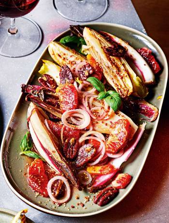 Roasted chicory with blood orange and salted pecans