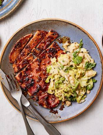 Chutney-glazed gammon steaks with white bean colcannon