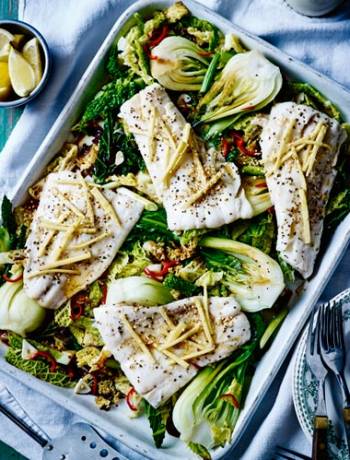Sizzling haddock with greens and sesame seeds