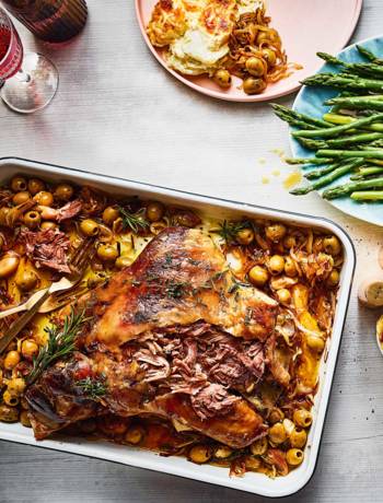 Lamb shoulder, caramelised onions and olives with buttered asparagus