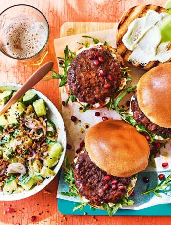 Sticky pomegranate beef burgers with tahini-cucumber salad
